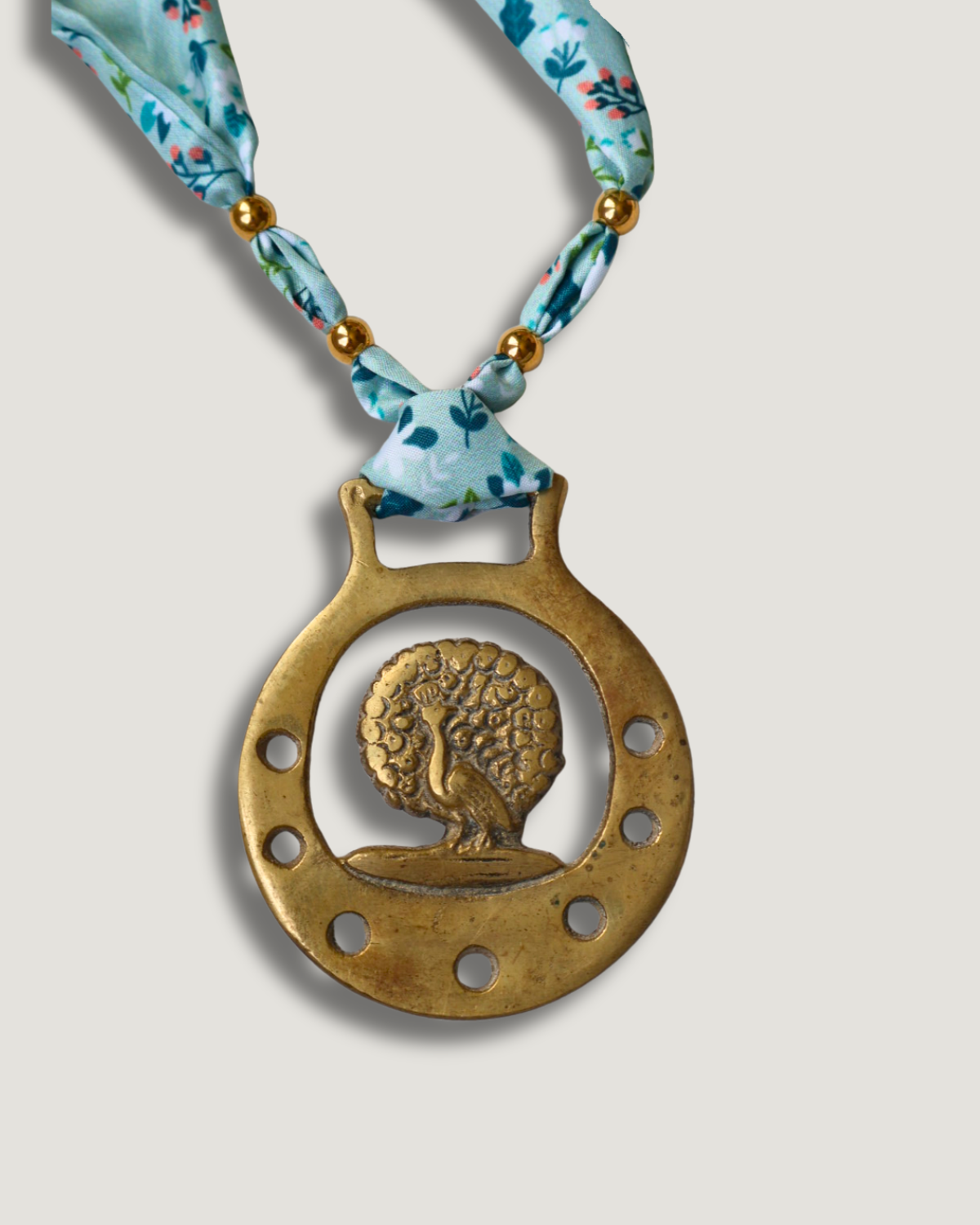 The Peacock Vintage Brass